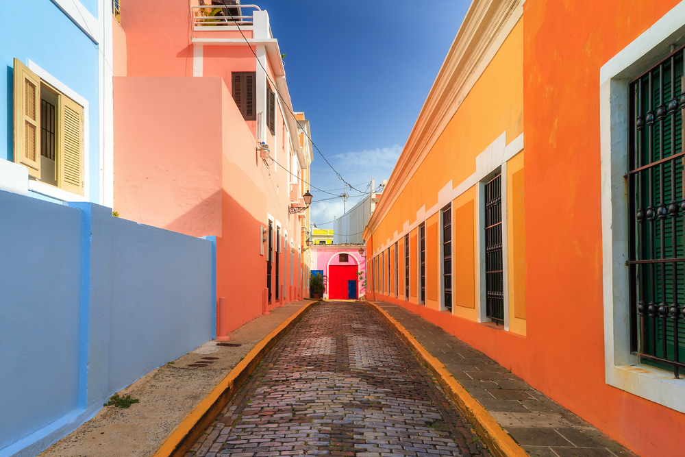 a view down a colorful alleyway in puerto rico